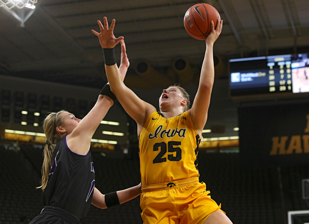 Iowa forward/center Monika Czinano (25) makes a basket during the fourth quarter of their game against Winona State at Carver-Hawkeye Arena in Iowa City on Sunday, Nov 3, 2019. (Stephen Mally/hawkeyesports.com)