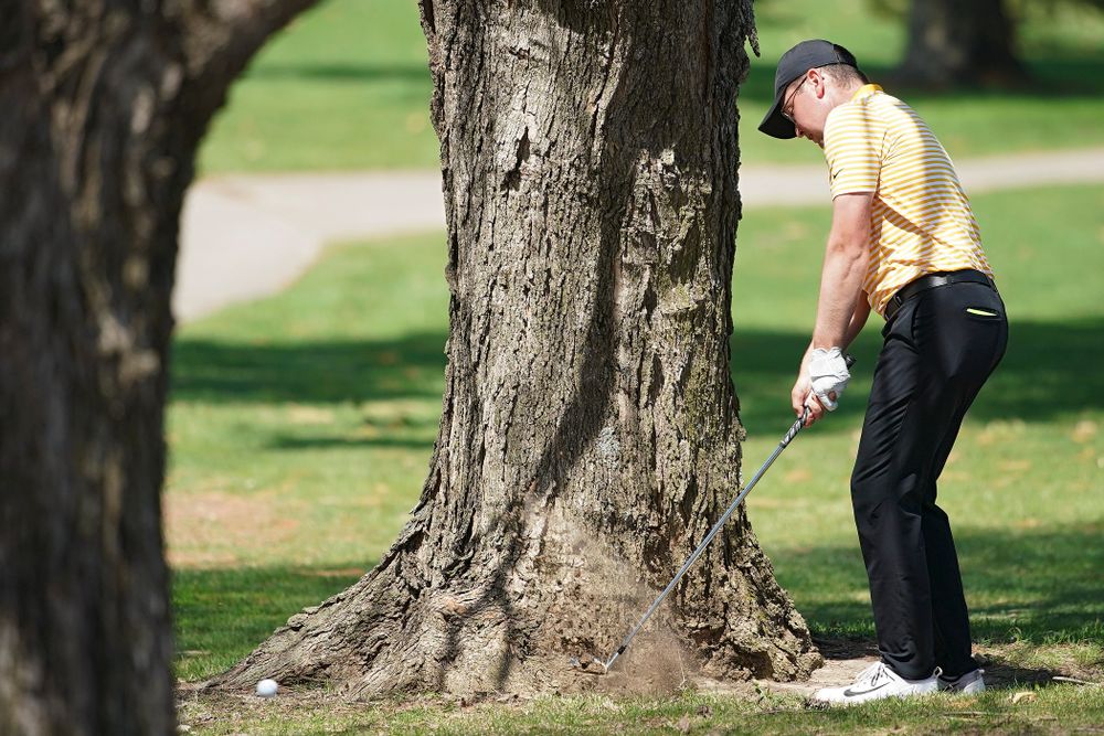 Iowa's Matthew Walker hits through the trees on the 18th hole during the third round of the Hawkeye Invitational at Finkbine Golf Course in Iowa City on Sunday, Apr. 21, 2019. (Stephen Mally/hawkeyesports.com)