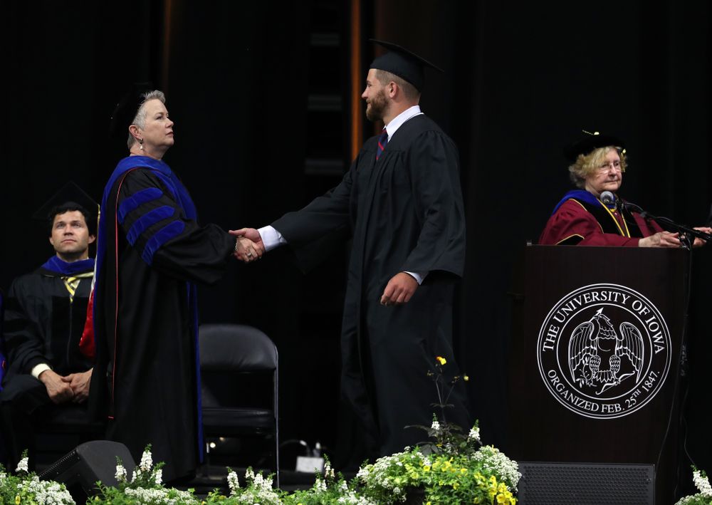 Hawkeye FootballÕs Jackson Subbert during the Tippie College of Business spring commencement Saturday, May 11, 2019 at Carver-Hawkeye Arena. (Brian Ray/hawkeyesports.com)