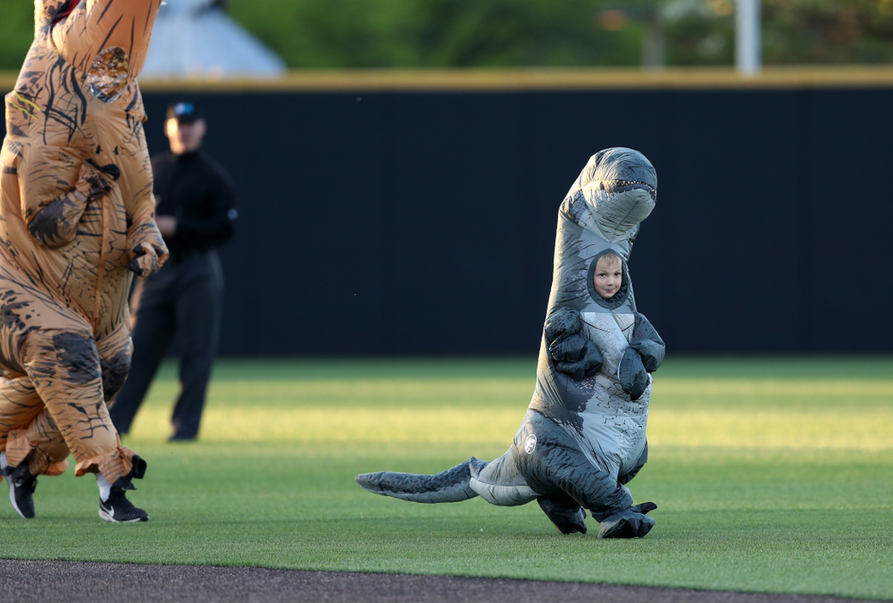 Connor Gorzelanny runs the dinosaur race during the Iowa Hawkeyes game against the Michigan State Spartans Friday, May 10, 2019 at Duane Banks Field. (Brian Ray/hawkeyesports.com)