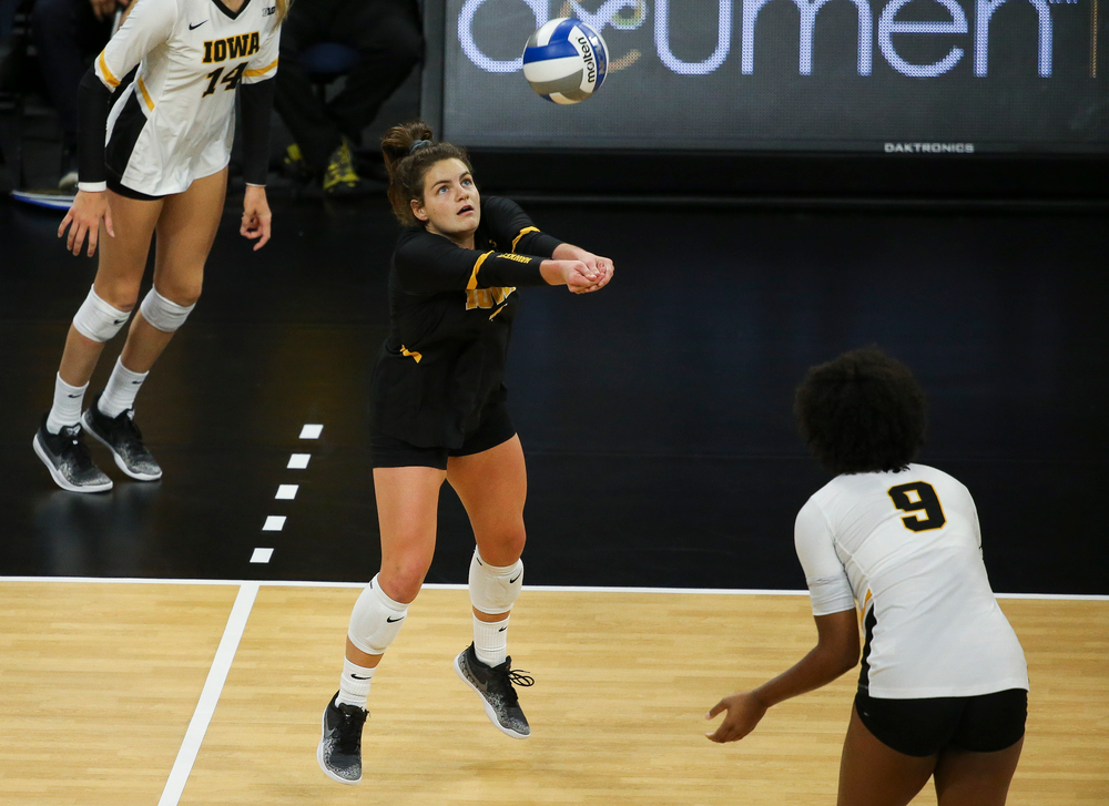 Iowa Hawkeyes defensive specialist Molly Kelly (1) bumps the ball during a game against Purdue at Carver-Hawkeye Arena on October 13, 2018. (Tork Mason/hawkeyesports.com)