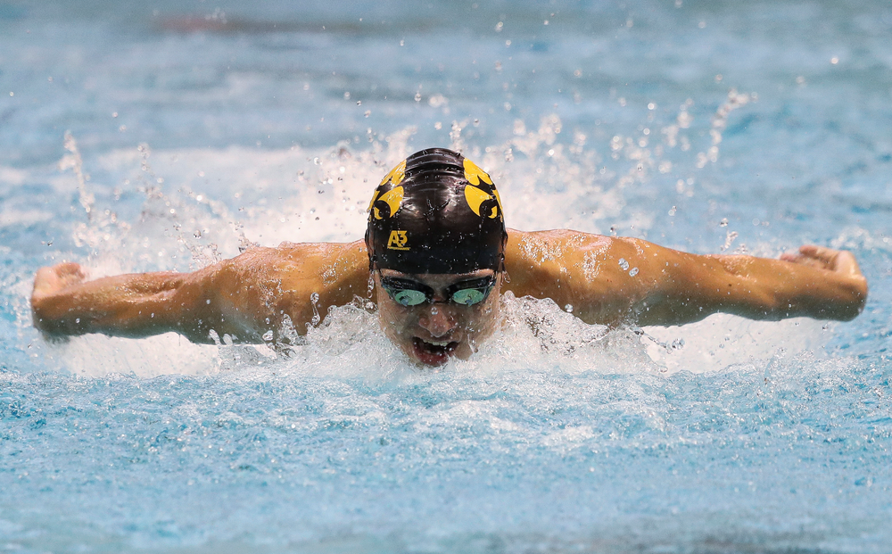 Iowa's Michael Tenney competes in the 100-yard butterfly during a meet against Michigan and Denver at the Campus Recreation and Wellness Center on November 3, 2018. (Tork Mason/hawkeyesports.com)