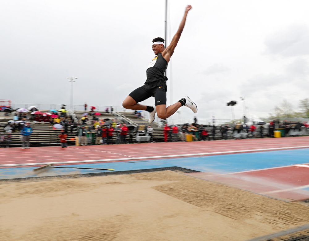 Iowa's James Carter jumps in the men’s long jump event on the second day of the Big Ten Outdoor Track and Field Championships at Francis X. Cretzmeyer Track in Iowa City on Saturday, May. 11, 2019. (Stephen Mally/hawkeyesports.com)