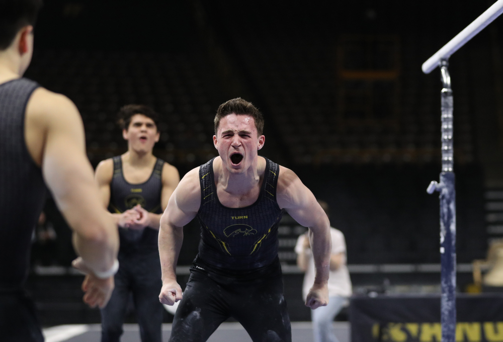 Iowa's Jake Brodarzon competes on the parallel bars against the Ohio State Buckeyes Saturday, March 16, 2019 at Carver-Hawkeye Arena. (Brian Ray/hawkeyesports.com)