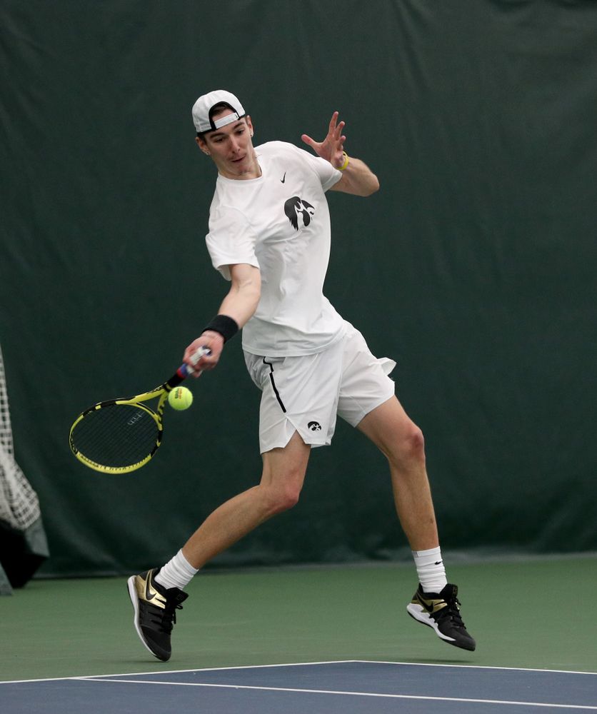 Iowa’s Nikita Snezhko against Cornell Sunday, March 8, 2020 at the Hawkeye Tennis and Recreation Center. (Brian Ray/hawkeyesports.com)