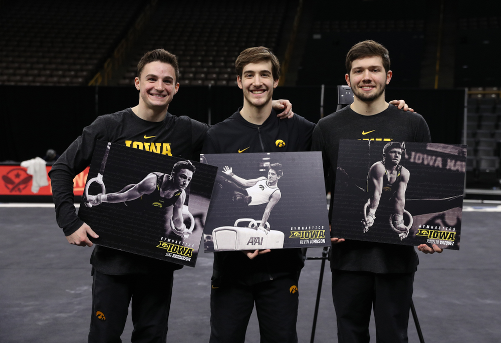 Iowa Men's Gymnastics seniors Jake Brodarzon, Kevin Johnson, and Rogelio Vazquez during senior day ceremonies following their meet against the Ohio State Buckeyes Saturday, March 16, 2019 at Carver-Hawkeye Arena. (Brian Ray/hawkeyesports.com)