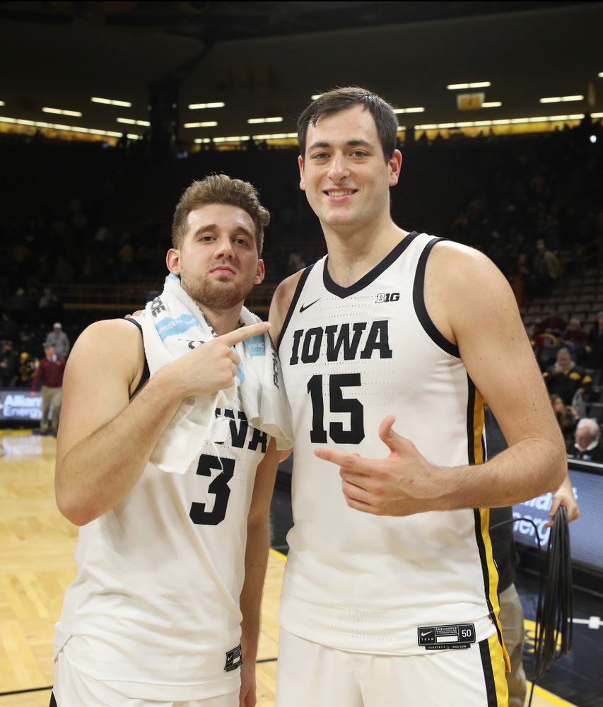 Iowa Hawkeyes guard Jordan Bohannon (3) and forward Ryan Kriener (15) against the Minnesota Golden Gophers Monday, December 9, 2019 at Carver-Hawkeye Arena. (Brian Ray/hawkeyesports.com)