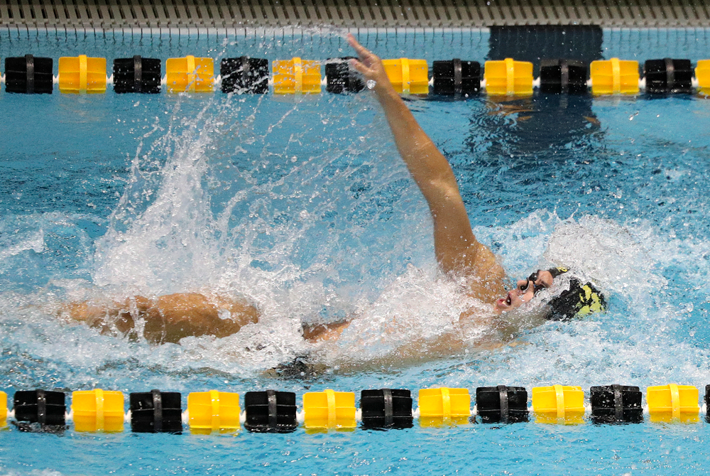 Iowa’s Preston Planells swims the men’s 100-yard backstroke event during their meet against Michigan State and Northern Iowa at the Campus Recreation and Wellness Center in Iowa City on Friday, Oct 4, 2019. (Stephen Mally/hawkeyesports.com)