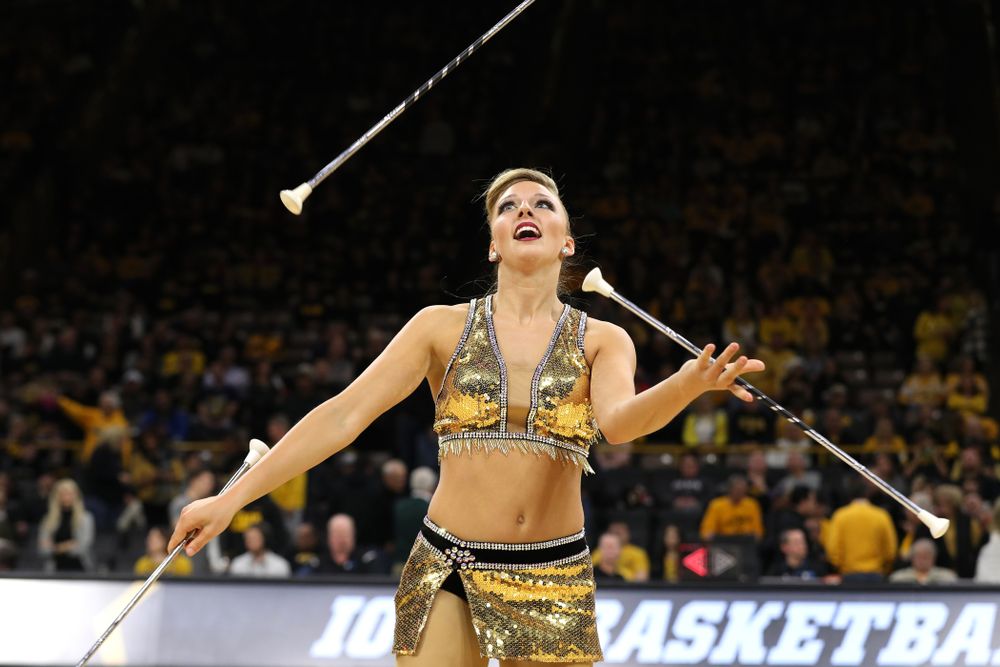 Hawkeye Marching Band Golden Girl ?Kylene Spanbauer performs at halftime of the Iowa Hawkeyes game against the Michigan Wolverines Friday, February 1, 2019 at Carver-Hawkeye Arena. (Brian Ray/hawkeyesports.com)