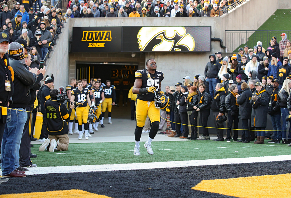 Iowa Hawkeyes defensive lineman Cedrick Lattimore (95) is acknowledged on senior day before their game at Kinnick Stadium in Iowa City on Saturday, Nov 23, 2019. (Stephen Mally/hawkeyesports.com)