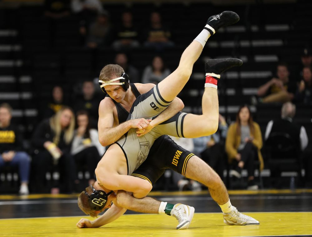 Iowa's Carter Happel wrestles Purdue's Parker Filius at 149 pounds Saturday, November 24, 2018 at Carver-Hawkeye Arena. (Brian Ray/hawkeyesports.com)