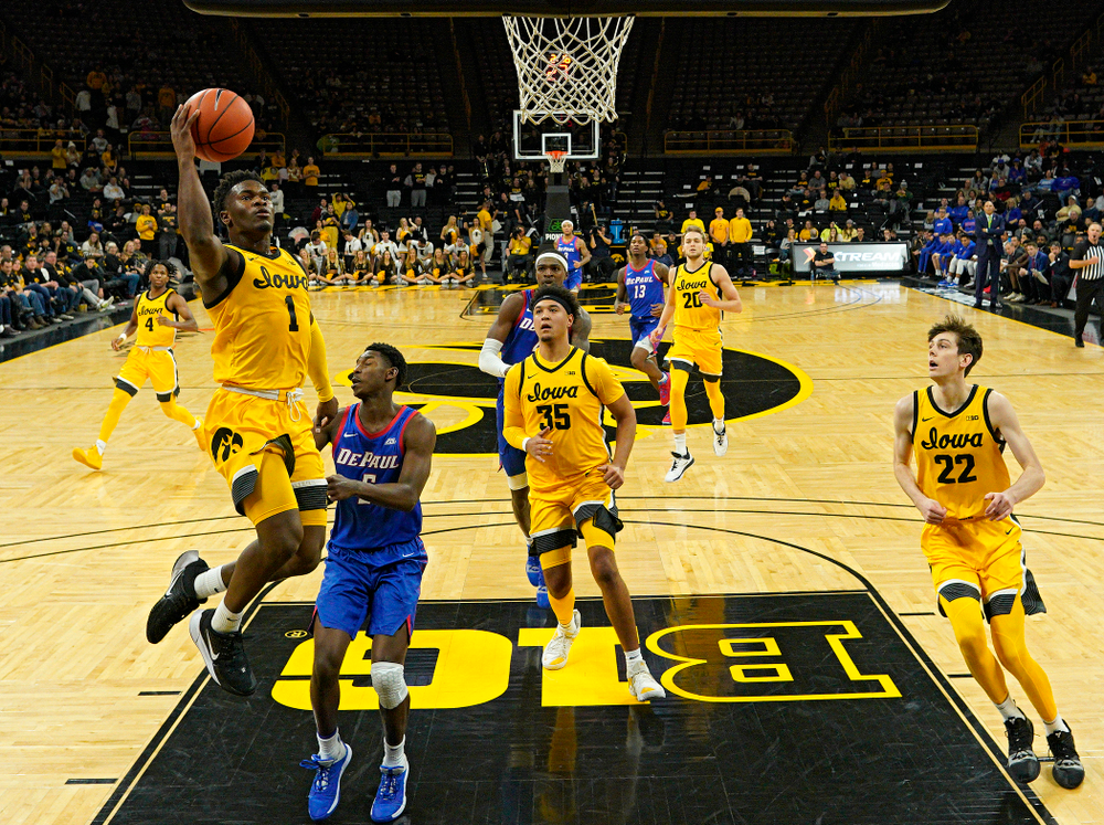 Iowa Hawkeyes guard Joe Toussaint (1) scores a basket during the second half of their game at Carver-Hawkeye Arena in Iowa City on Monday, Nov 11, 2019. (Stephen Mally/hawkeyesports.com)
