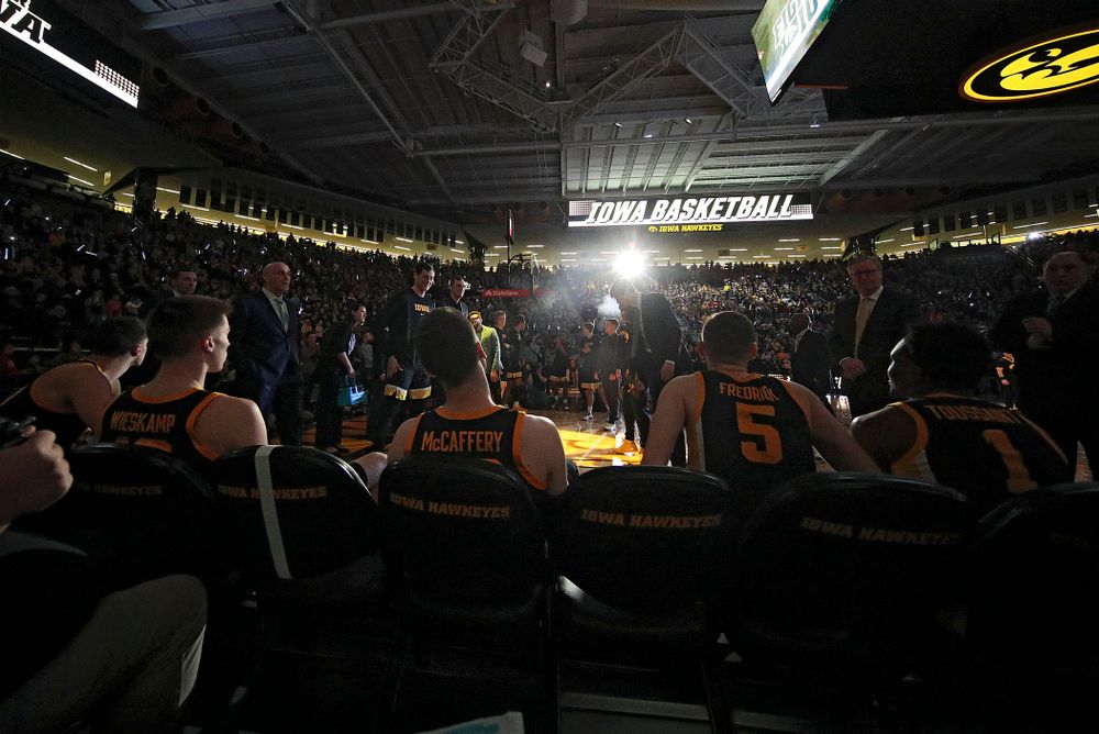 Iowa Hawkeyes center Luka Garza (55), guard Joe Wieskamp (10), guard Connor McCaffery (30), guard CJ Fredrick (5), and guard Joe Toussaint (1) wait to be introduced before their game at Carver-Hawkeye Arena in Iowa City on Monday, January 27, 2020. (Stephen Mally/hawkeyesports.com)
