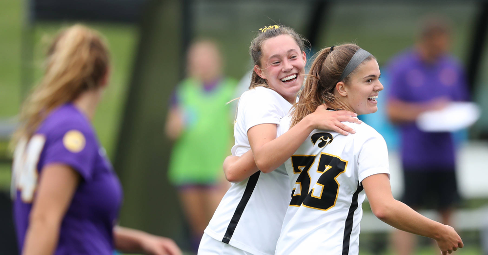 Iowa Hawkeyes forward Skylar Alward (7) celebrates with defender Riley Burns (33) after scoring during a 6-1 win over Northern Iowa Sunday, August 25, 2019 at the Iowa Soccer Complex. (Brian Ray/hawkeyesports.com)