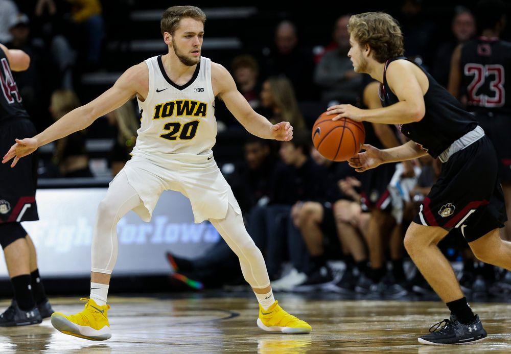 Iowa Hawkeyes forward Riley Till (20) defends during a game against Guilford College at Carver-Hawkeye Arena on November 4, 2018. (Tork Mason/hawkeyesports.com)
