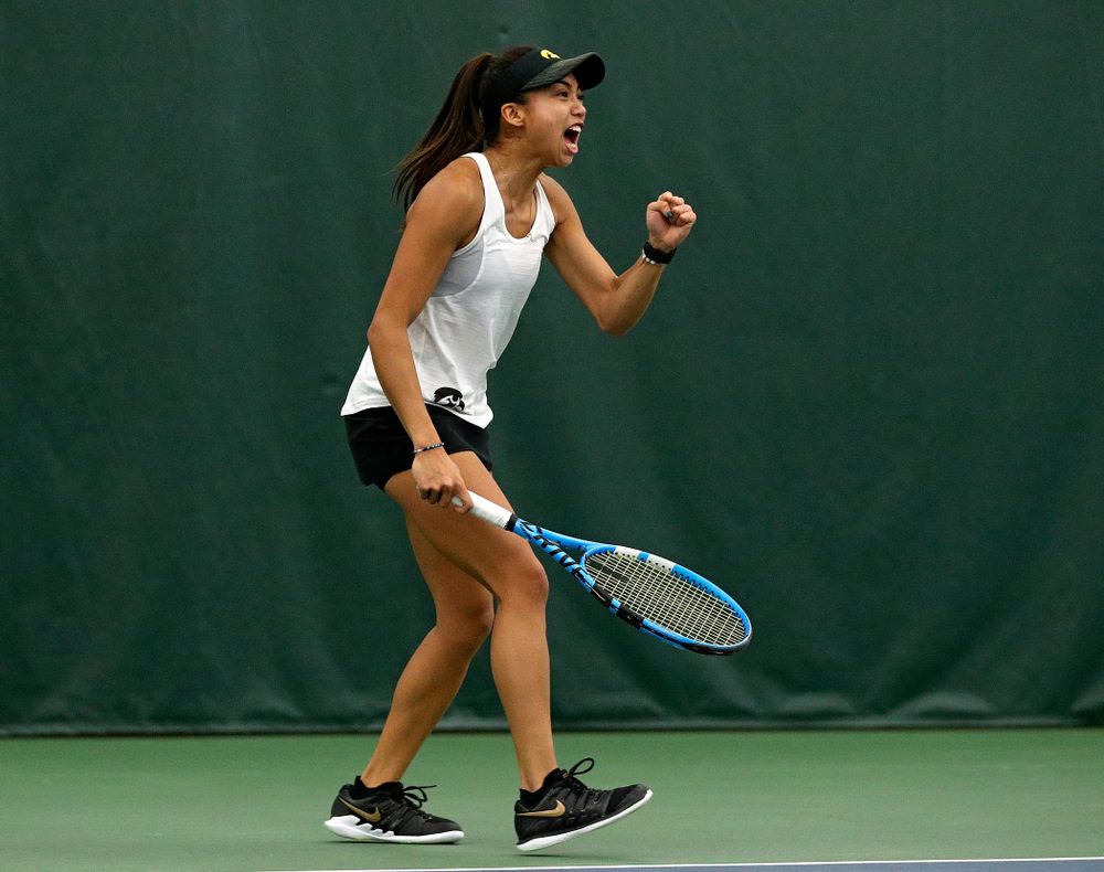 Iowa’s Michelle Bacalla celebrates a point during her doubles match at the Hawkeye Tennis and Recreation Complex in Iowa City on Sunday, February 23, 2020. (Stephen Mally/hawkeyesports.com)