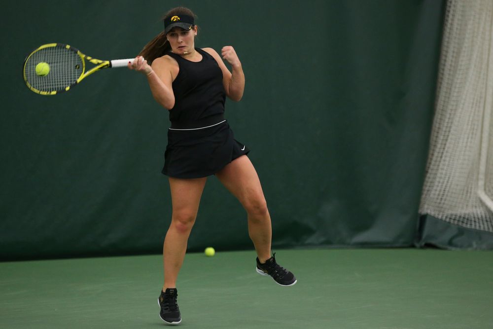 Iowa’s Danielle Bauers returns a hit during the Iowa women’s tennis meet vs UNI on Saturday, February 29, 2020 at the Hawkeye Tennis and Recreation Complex. (Lily Smith/hawkeyesports.com)