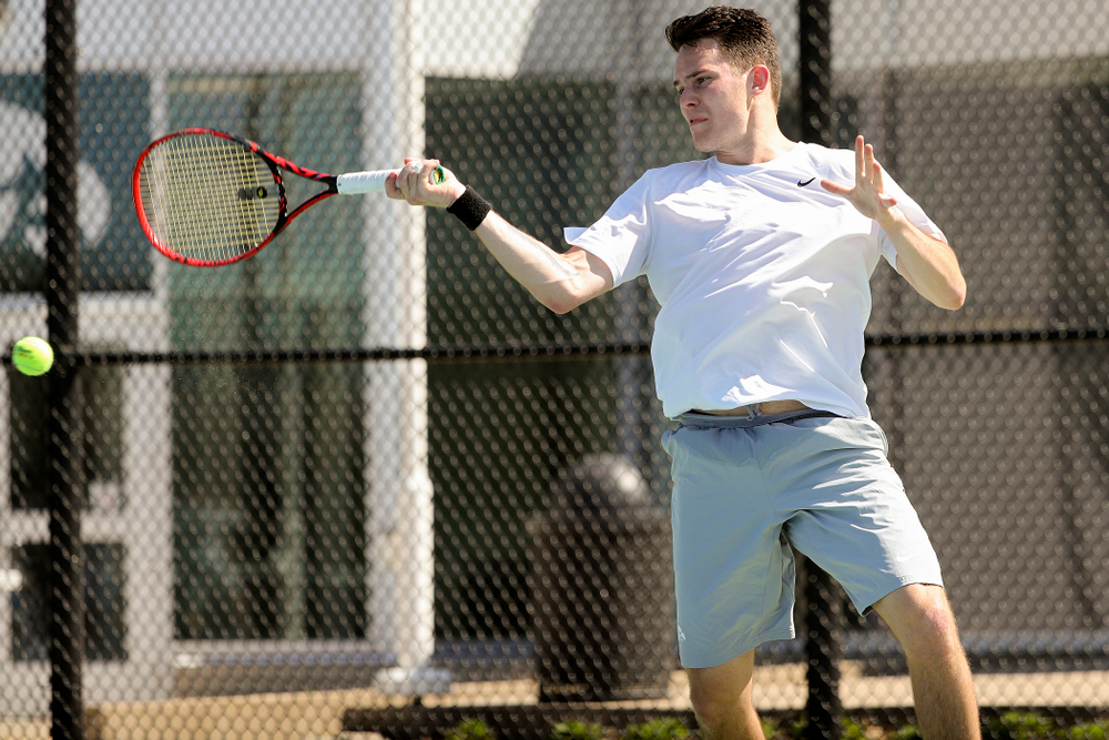 Iowa's Jonas Larson during his match against Michigan at the Hawkeye Tennis and Recreation Complex in Iowa City on Sunday, Apr. 21, 2019. (Stephen Mally/hawkeyesports.com)
