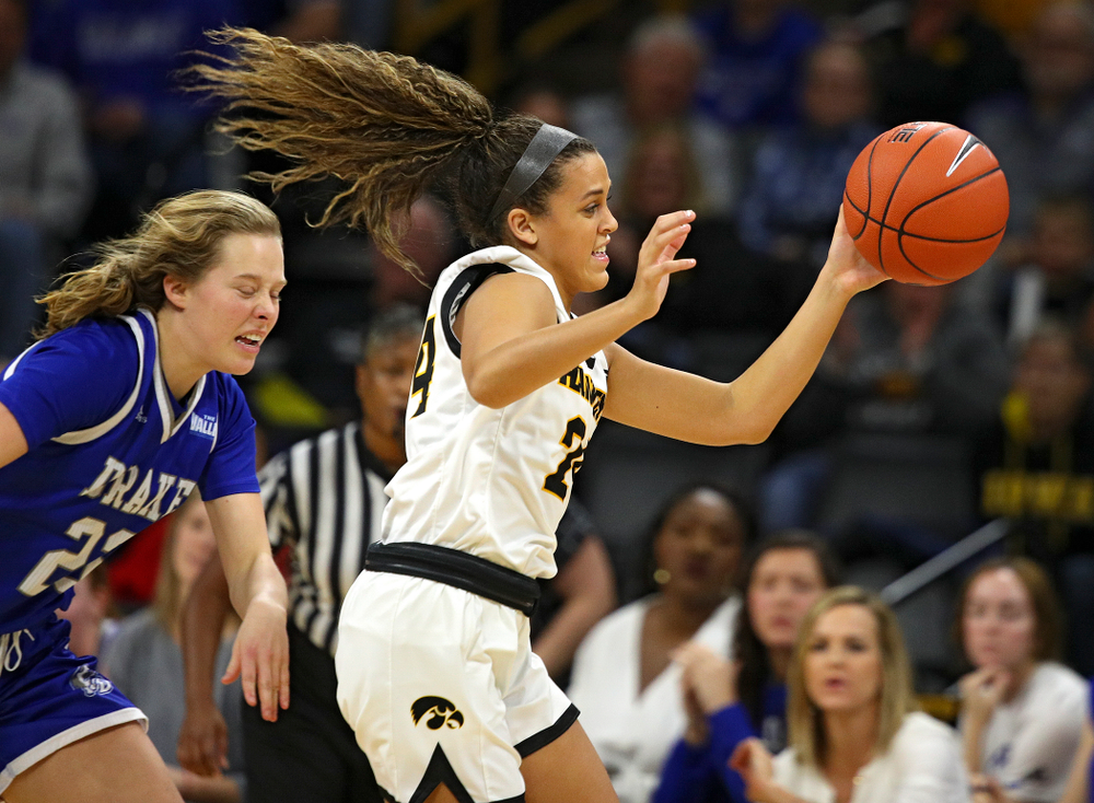 Iowa Hawkeyes guard Gabbie Marshall (24) steals the ball away during the third quarter of their game at Carver-Hawkeye Arena in Iowa City on Saturday, December 21, 2019. (Stephen Mally/hawkeyesports.com)
