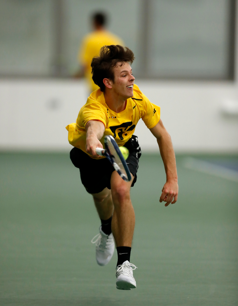 Piotr Smietana against the Illinois Fighting Illini Saturday, March 31, 2018 at Hawkeye Tennis and Recreation Center. (Brian Ray/hawkeyesports.com)