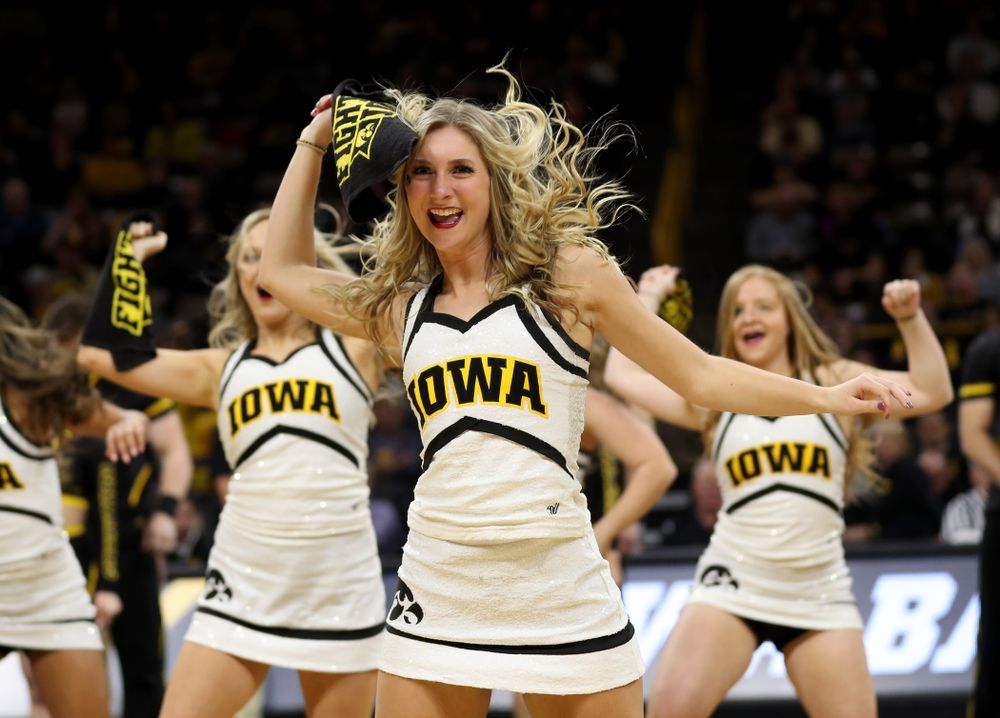 The Iowa Cheerleaders and Dance Team perform on senior night at half-time of the Iowa Hawkeyes game against the Purdue Boilermakers Tuesday, March 3, 2020 at Carver-Hawkeye Arena. (Brian Ray/hawkeyesports.com)