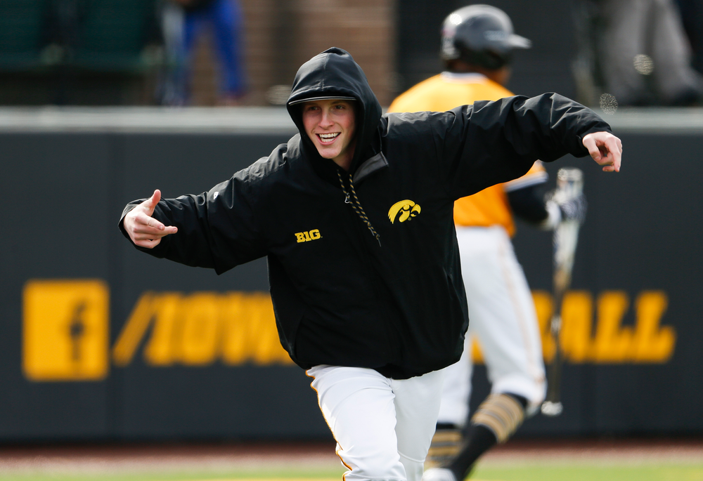 Iowa Hawkeyes pitcher Shane Ritter (18) reacts after the Hawkeyes take a 3-2 eighth inning lead during a game against Evansville at Duane Banks Field on March 18, 2018. (Tork Mason/hawkeyesports.com)