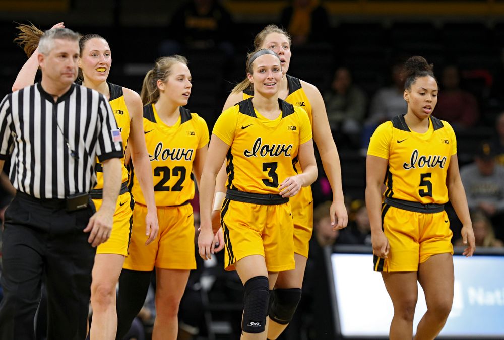 Iowa Hawkeyes forward Amanda Ollinger (43),l guard Kathleen Doyle (22), guard Makenzie Meyer (3), forward Monika Czinano (25), and guard Alexis Sevillian (5) head down the court during the fourth quarter of their game at Carver-Hawkeye Arena in Iowa City on Thursday, January 23, 2020. (Stephen Mally/hawkeyesports.com)