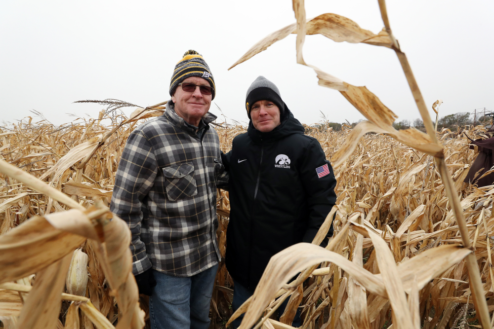 Head Coach Tom Brands poses for a photo with former Head Coach Dan Gable during the teamÕs annual media day Wednesday, October 30, 2019 at Kroul Family Farms in Mount Vernon. (Brian Ray/hawkeyesports.com)