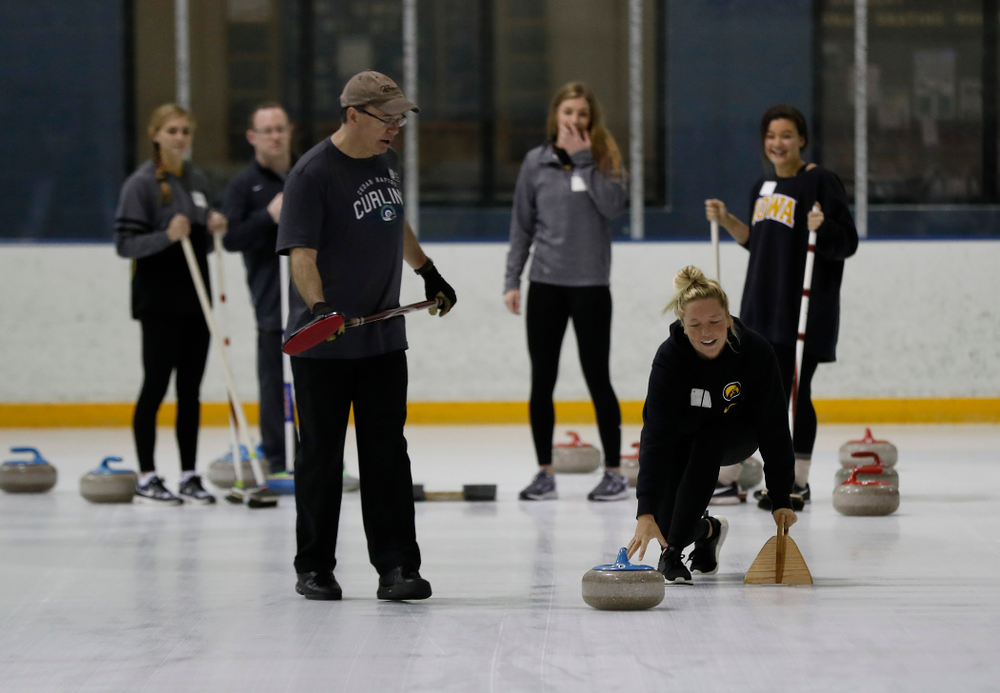 Members of the Iowa Softball team learn the sport of curling as part of a team building event Wednesday, January 10, 2018 at the Cedar Rapids Ice Arena. (Brian Ray/hawkeyesports.com)