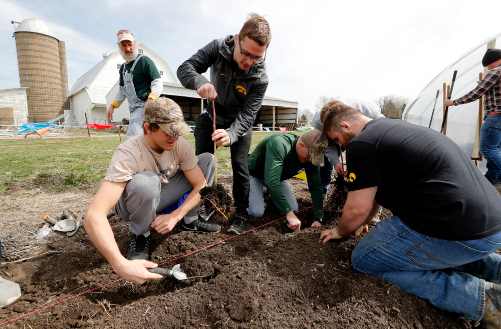 Members of the Iowa Wrestling Team volunteer during the Iowa Athletics Department's annual Day of Caring Sunday, April 22, 2018. (Brian Ray/hawkeyesports.com)