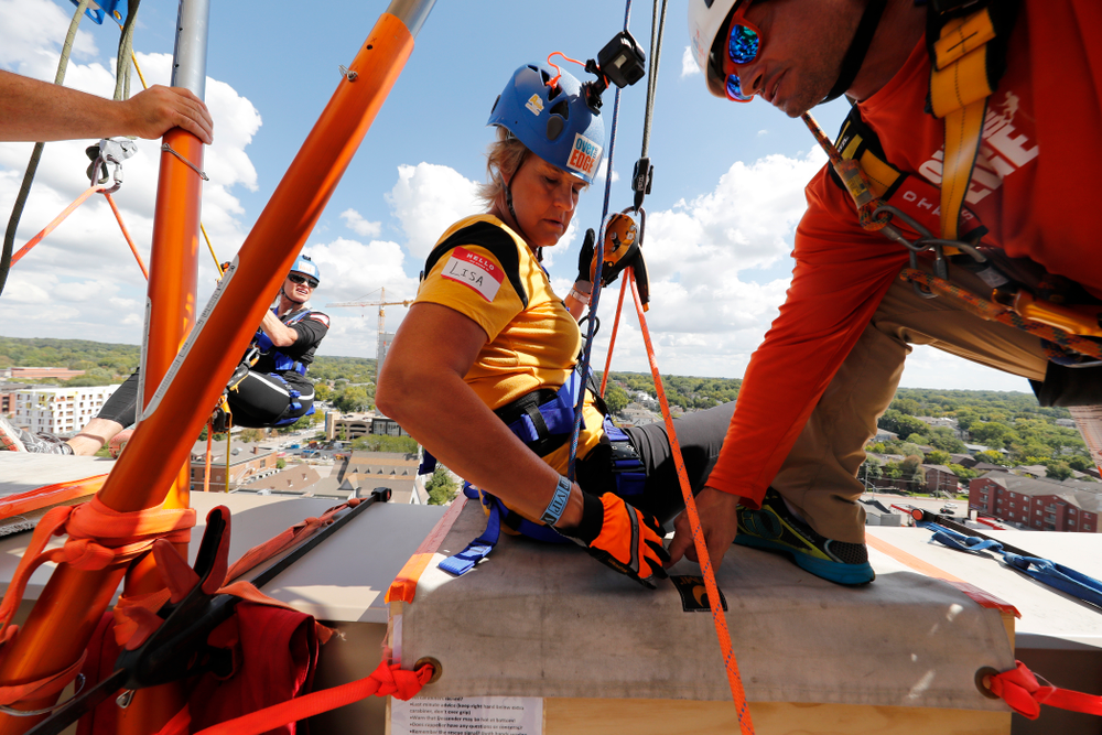 Iowa Women's Basketball head coach Lisa Bluder goes Over The Edge to benefit Ronald McDonald House Charities of Eastern Iowa and Western Illinois Friday, September 14, 2018 in downtown Iowa City.(Brian Ray/hawkeyesports.com)