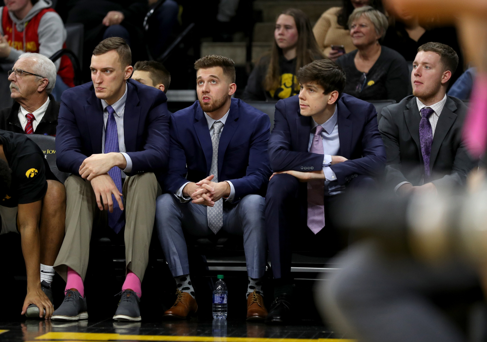 Iowa Hawkeyes forward Jack Nunge (2), guard Jordan Bohannon (3), and forward Patrick McCaffery (22) against the Maryland Terrapins Friday, January 10, 2020 at Carver-Hawkeye Arena. (Brian Ray/hawkeyesports.com)