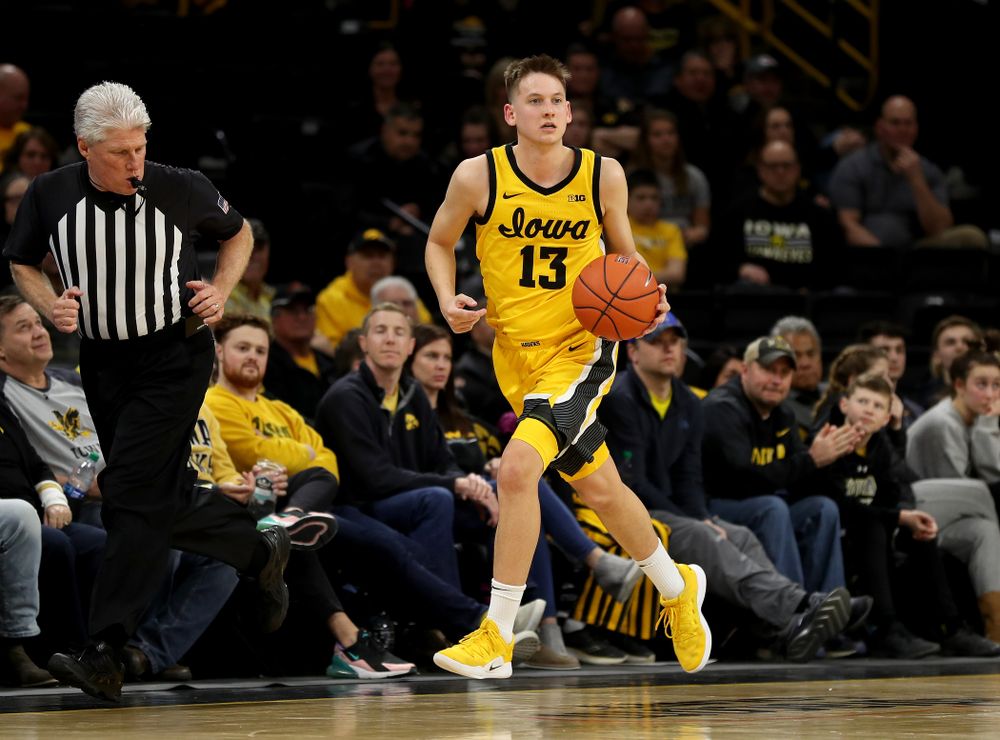 Iowa Hawkeyes guard Austin Ash (13) against the Nebraska Cornhuskers Saturday, February 8, 2020 at Carver-Hawkeye Arena. (Brian Ray/hawkeyesports.com)