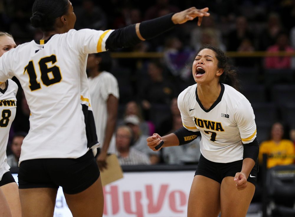 Iowa Hawkeyes setter Brie Orr (7) celebrates after winning a point during a match against Nebraska at Carver-Hawkeye Arena on November 7, 2018. (Tork Mason/hawkeyesports.com)