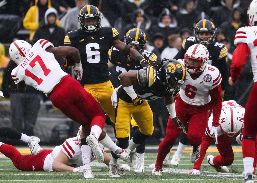 Iowa Hawkeyes wide receiver Ihmir Smith-Marsette (6) returns a kickoff during a game against Nebraska at Kinnick Stadium on November 23, 2018. (Tork Mason/hawkeyesports.com)