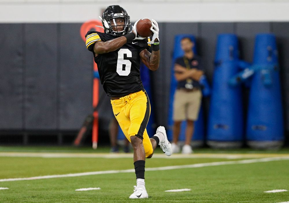 Iowa Hawkeyes wide receiver Ihmir Smith-Marsette (6) pulls in a pass during Fall Camp Practice No. 6 at the Hansen Football Performance Center in Iowa City on Thursday, Aug 8, 2019. (Stephen Mally/hawkeyesports.com)
