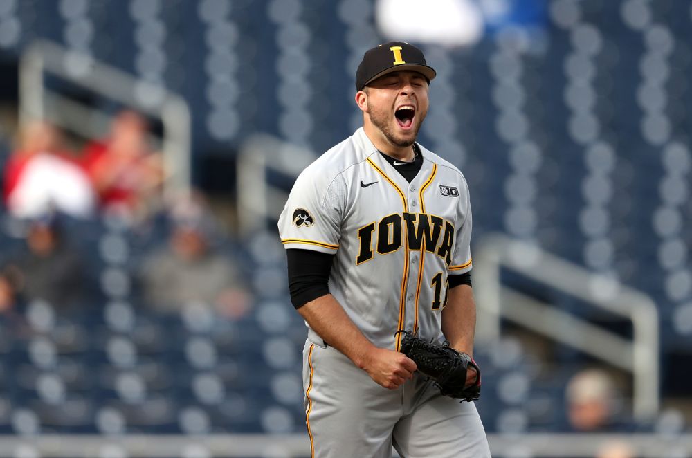 Iowa Hawkeyes Cole McDonald (11) reacts after getting a strikeout to end an inning against the Indiana Hoosiers in the first round of the Big Ten Baseball Tournament Wednesday, May 22, 2019 at TD Ameritrade Park in Omaha, Neb. (Brian Ray/hawkeyesports.com)