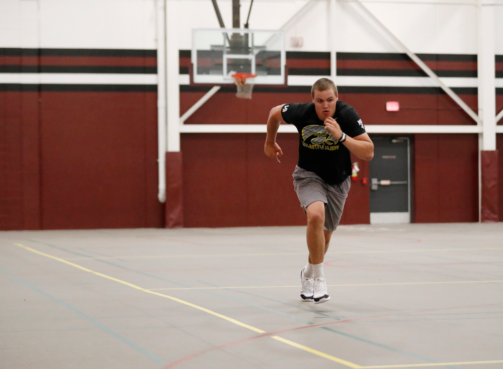 Iowa Hawkeyes quarterback Nathan Stanley (4) works out at his high school Wednesday, May 30, 2018 in Menomonie, Wisc. (Brian Ray/hawkeyesports.com)
