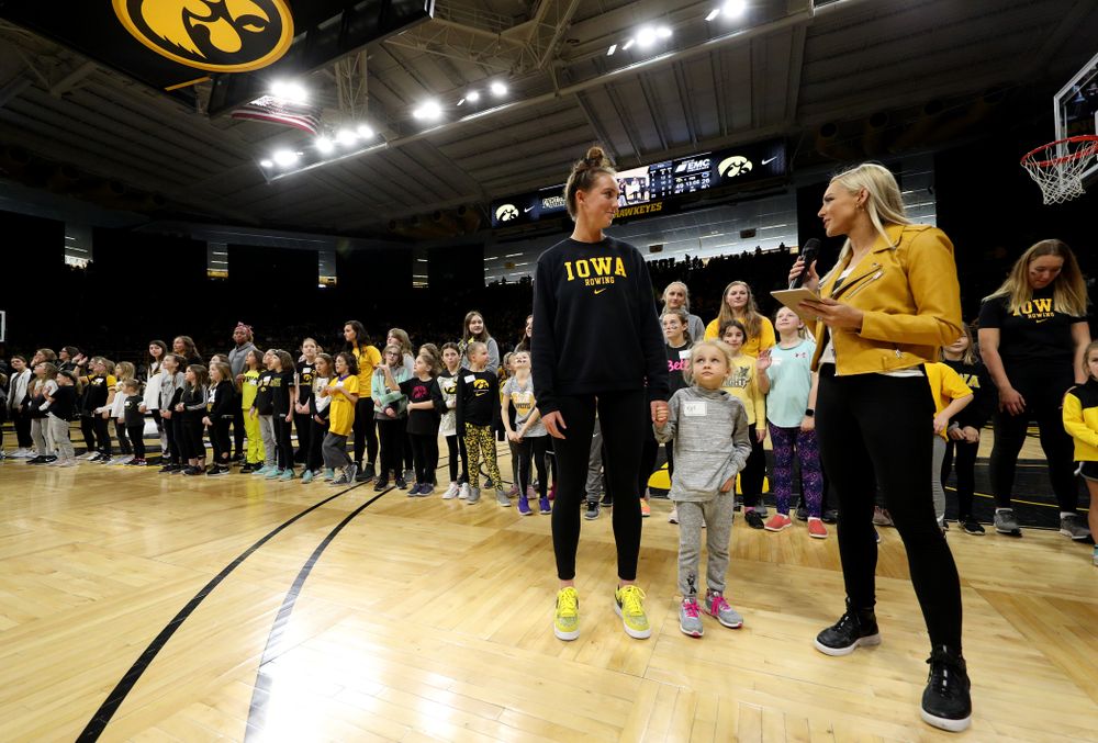 Female Athletes and participants in a youth clinic are recognized as part of National Girls and Women in Sports Day during the Iowa Hawkeyes game against Penn State Saturday, February 22, 2020 at Carver-Hawkeye Arena. (Brian Ray/hawkeyesports.com)