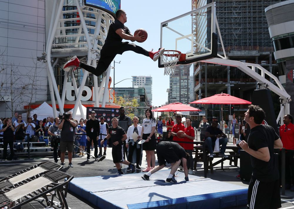 Iowa Hawkeyes forward Megan Gustafson (10) judges dunks with DukeÕs Zion Williamson during a Special Olympics event Friday, April 12, 2019 as part of the ESPN College Basketball Awards in the XBOX Plaza at LA Live. (Brian Ray/hawkeyesports.com)