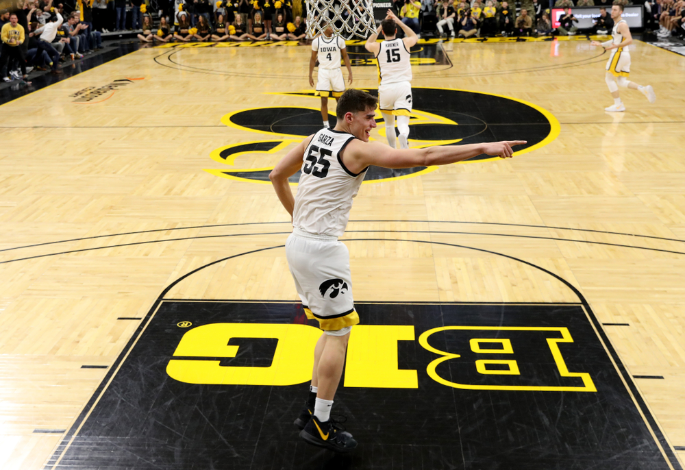 Iowa Hawkeyes forward Luka Garza (55) celebrates a dunk against Penn State Saturday, February 29, 2020 at Carver-Hawkeye Arena. (Brian Ray/hawkeyesports.com)