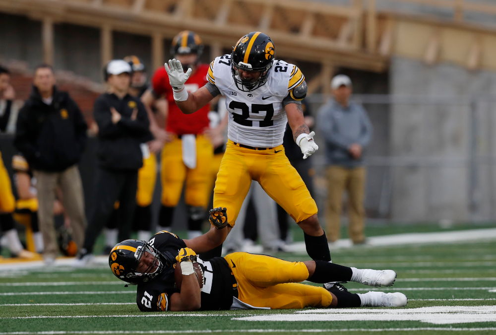 Iowa Hawkeyes defensive back Amani Hooker (27) and running back Ivory Kelly-Martin (21) during the final spring practice Friday, April 20, 2018 at Kinnick Stadium. (Brian Ray/hawkeyesports.com)