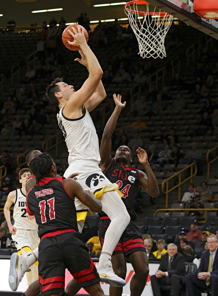 Iowa Hawkeyes forward Ryan Kriener (15) puts up a shot during the second half of their game at Carver-Hawkeye Arena in Iowa City on Friday, Nov 8, 2019. (Stephen Mally/hawkeyesports.com)