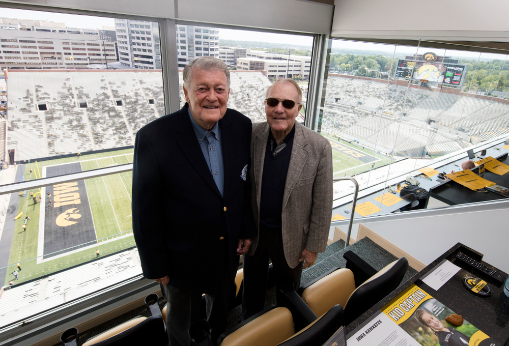 Former Iowa Hawkeyes head coach Hayden Fry and former athletics director Bump Elliott stands in the press box Saturday, September 3, 2016 at Kinnick Stadium. (Brian Ray/hawkeyesports.com)