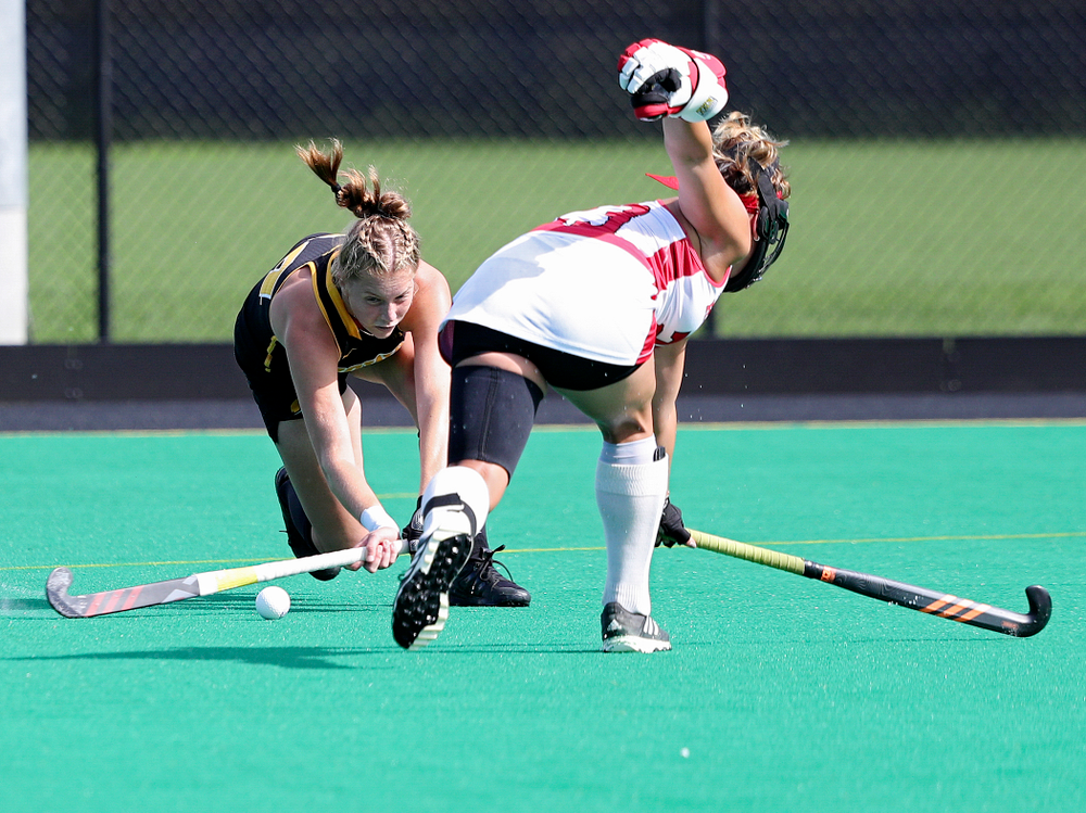 Iowa’s Lokke Stribos (14) scores a goal during the first quarter of their match at Grant Field in Iowa City on Friday, Oct 4, 2019. (Stephen Mally/hawkeyesports.com)