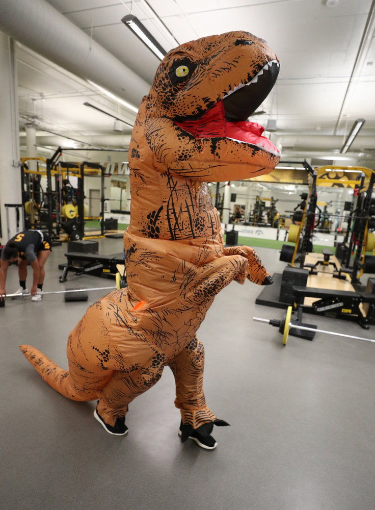 Iowa Hawkeyes head coach Lisa Bluder surprises her team during a workout dressed as a T-Rex for Halloween Wednesday, October 31, 2018 at Carver-Hawkeye Arena. (Brian Ray/hawkeyesports.com)