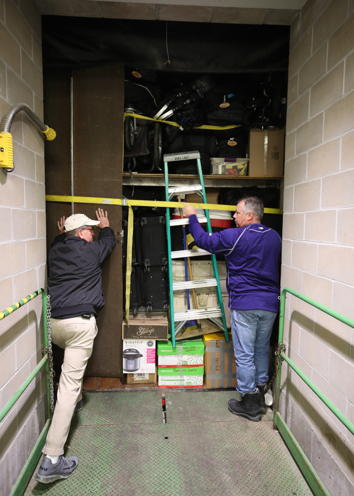 Hawkeye Football equipment managers Greg Morris and Kevin Foor prepare to close the doors on Hawk One before its departure for the Outback Bowl in Tampa, Florida Friday, December 21, 2018 at the Hansen Football Performance Center. (Brian Ray/hawkeyesports.com)