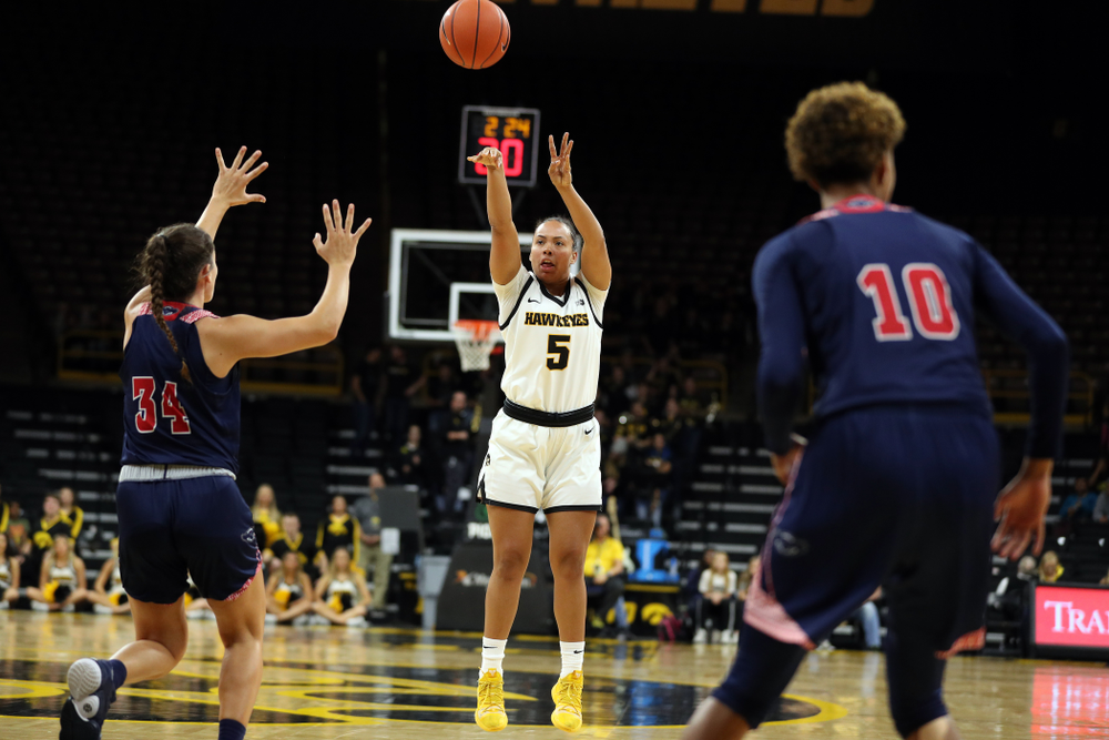 Iowa Hawkeyes guard Alexis Sevillian (5) knocks down a three point basket against Florida Atlantic University Thursday, November 7, 2019 at Carver-Hawkeye Arena. (Brian Ray/hawkeyesports.com)