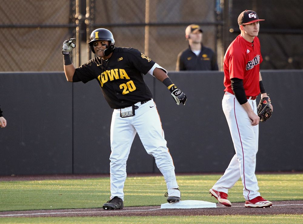 Iowa infielder Izaya Fullard (20) celebrates after hitting a triple during the third inning of their game at Duane Banks Field in Iowa City on Tuesday, March 3, 2020. (Stephen Mally/hawkeyesports.com)