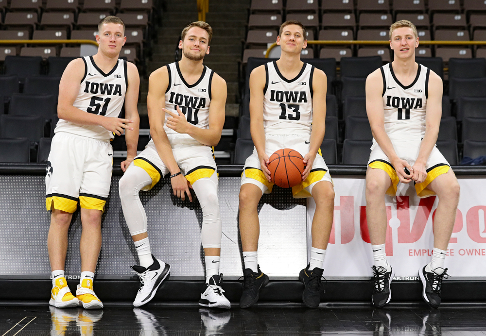 Iowa Hawkeyes guard Aidan Vanderloo (51), forward Riley Till (20), guard Austin Ash (13), and forward Michael Baer (0) during Iowa Men’s Basketball Media Day at Carver-Hawkeye Arena in Iowa City on Wednesday, Oct 9, 2019. (Stephen Mally/hawkeyesports.com)